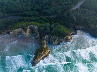 The cold Pacific Ocean crashes against the rugged coastline of northern Oregon. This Pacific Northwest is known for its spectacular outdoor scenery.