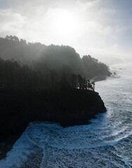 Morning sunlight illuminates the spectacular and rugged coastline of northern Oregon. This Pacific...