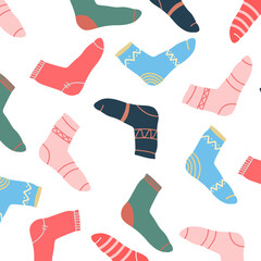 Vector seamless pattern with socks. Warm socks with patterns.