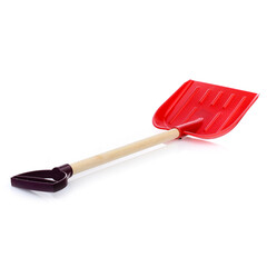 Children's large shovel isolated on a white background. Colored plastic shovels for snow removal. Children's Sandbox Toys