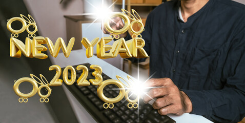 Asian man hold UI interface web map app cloud online to laptop so finger touch online connect app 2023. 2023 new year number logo concept. Year of the rabbit  2023 new technology of people.