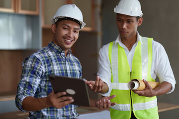 Professional architect designer structural engineer team colleagues discussing building plan design project