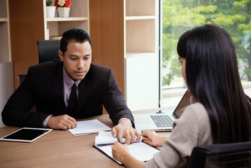 businessman boss leader coaching and teaching secretary on the job training in office. Business and Education concept