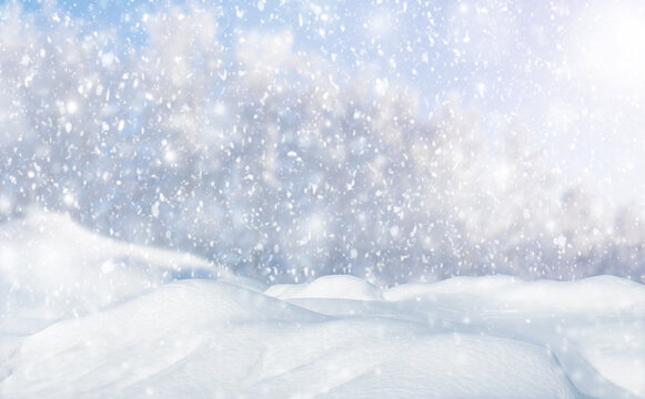 Winter background with heavy snow. Abstract snow among trees and snowdrifts. Frosty sunny weather.