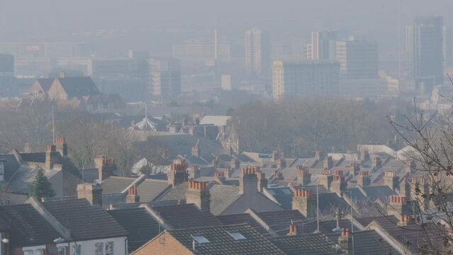 View over South East London Rooftops and Houses on Misty Morning, Victorian Terrace Streets and Tower Blocks