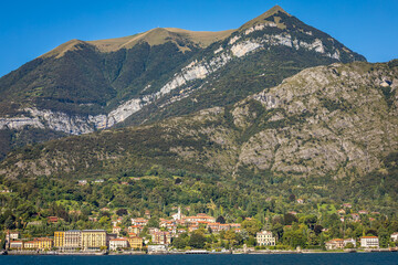 Tremezzo Village and mountain on Lake Como near Bellagio at sunset, Italy