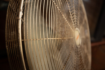 Close up shot of vintage white fan cage 