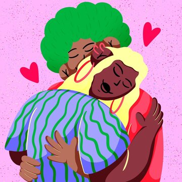 Two smiling people hug each other with love