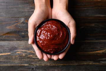 Gochujang (red chili paste), spicy and sweet fermented condiment in Korean food, Table top view