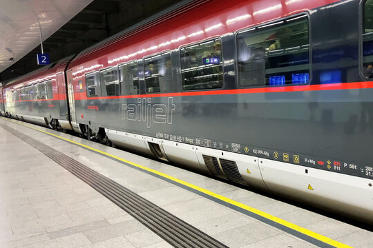 Austria Vienna. Passenger train Railjet arrive at the railway station platform. OBB,