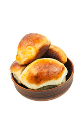 pies with apples in a clay bowl. the concept of home baking with yeast dough
