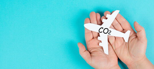 Airplane with CO 2, environment issue, carbon dioxide emmison by taking a flight, climate change...