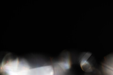 Blur colorful rainbow crystal light leaks on black background. Defocused abstract multicolored retro film lens flare bokeh analog photo overlay or screen filter effect. Glow Vintage prism colors