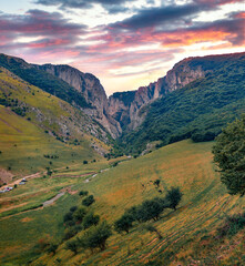 Great sunrise on Cheile Turzii canyon, large natural preserve with marked trails for scenic gorge hikes crossing streams and bridges, Romania, Europe. Beauty of nature concept background.