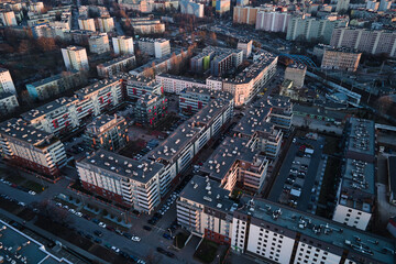 Modern residential complex in Wroclaw city, Poland. Aerial view of district with modern residence buildings, courtyards and parked cars.