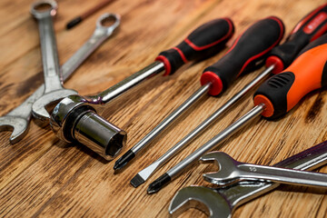 Close up of dusty construction tools on construction wood screws and moving parts and dowels