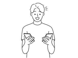 Smiling man holding cellphones 