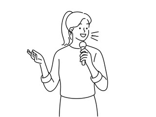 Woman with microphone perform on stage 