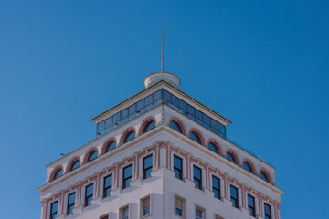 Famous neboticnik skyscraper in ljubljana, slovenia on a sunny day with blue background. Upper...