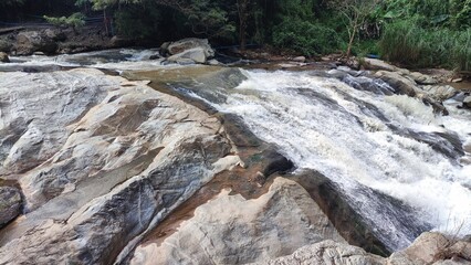 Mini waterfall in a small river