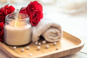 Spa composition with roses and candle, valentine's day concept.