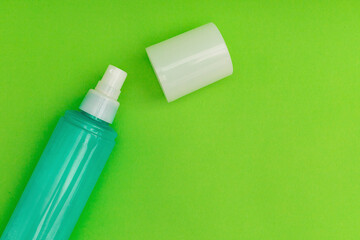 Washing foam, personal care products on a green background