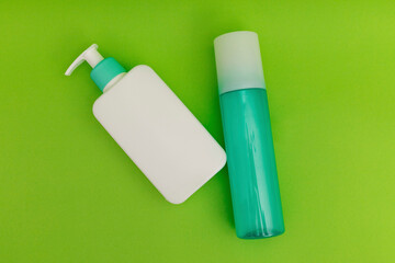 Washing foam, personal care products on a green background