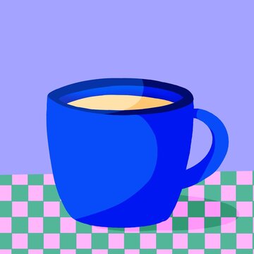 Liquid in a blue cup on top of a checkered table