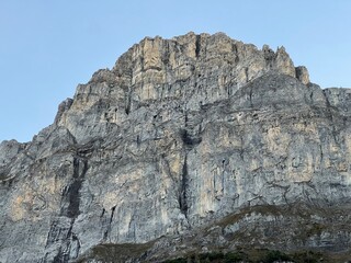 Rocky alpine peak Gigerwaldspitz (2291 m) above the reservoir lake Gigerwaldsee and in the UNESCO World Heritage Tectonic Arena Sardona (UNESCO-Welterbe Tektonikarena Sardona), Vättis - Switzerland