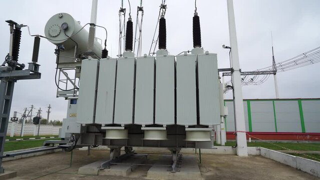 Power line industrial view, line of electric transmissions, view of the transformers, the process of energy conversion and transportation electricity.