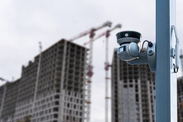 CCTV or surveillance camera watching for security 24 hours in construction site.