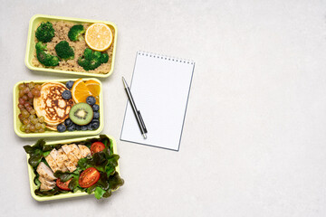 Ready meals for Breakfast, lunch, dinner in green recyclable containers on a white background. Delivery menu, lunch box concept