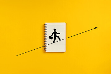 Personal ambition, vision and advancement in business career concept. Employee symbol walking the upwards line.