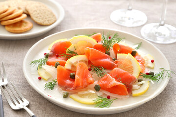 Smoked salmon salad with sliced onion ,lemon,dill and capers....