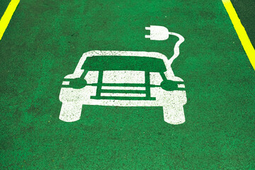 Parking sign at electric vehicles charging station