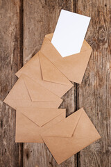 Envelopes made of craft paper and a white sheet of paper