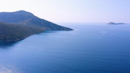 Beautiful landscape of sea and mountains. Epic seascape view from drone. Vacation concept.