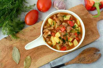 Bograch - Hungarian soup goulash with beef meat, potatoes, peppers and tomatoes