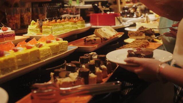Delicious buffet desserts. Close-up shoot of the buffet counter full of sweets.