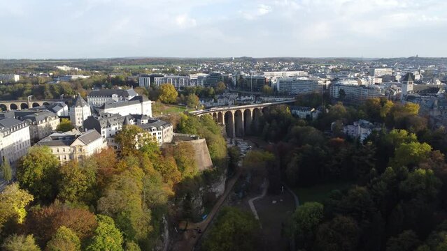 Scenic Drone Aerial Footage of Luxembourg City, including Cath&eacute;drale Notre-Dame, Pont Adolphe and Bourbon-Platte