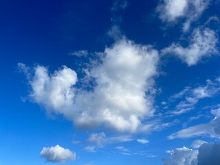Naklejka na ściany i meble Beautiful cloudy sky background, blue sky, fluffy clouds 