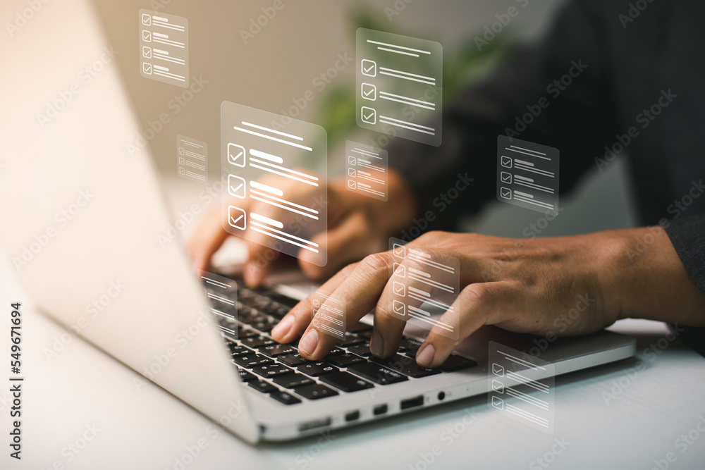 Fototapete Businessmen use laptops to searching, managing and access information  in files online document database, for efficient archiving and company data. Document Management System (DMS) concept.