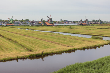 Fototapeta na wymiar Overview of the Zaanse Schans with Zaandam in the background