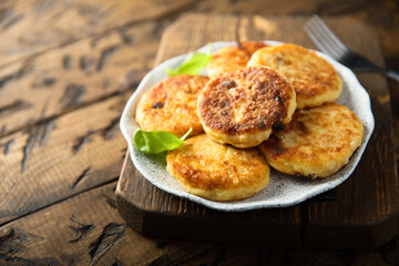 Homemade savory potato pancakes with fresh basil