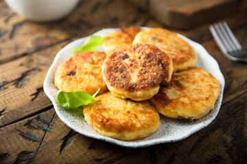 Homemade savory potato pancakes with fresh basil