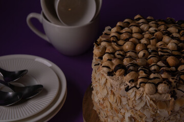 photo cake with plates with spoons cups and saucers