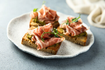 Toasts with ham and pesto