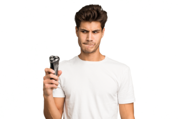 Young caucasian man holding a razor isolated confused, feels doubtful and unsure.