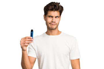Young caucasian man holding an electronic cigarette isolated confused, feels doubtful and unsure.