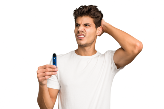 Young caucasian man holding an electronic cigarette isolated touching back of head, thinking and making a choice.